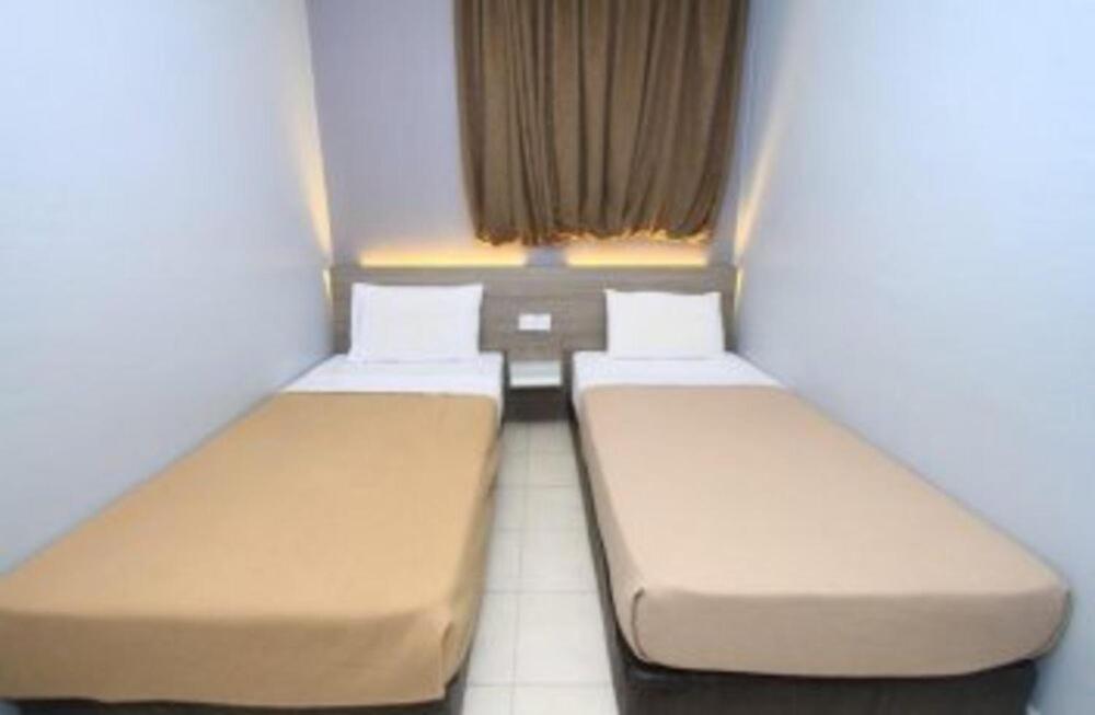 Malacca Yellow Mansion Hotel מראה חיצוני תמונה