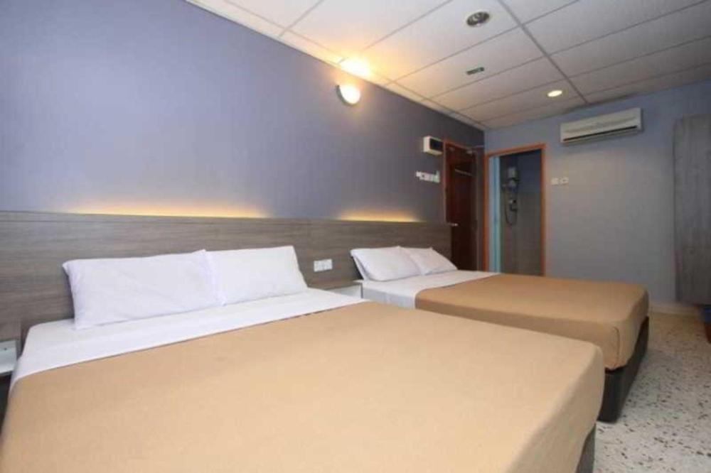 Malacca Yellow Mansion Hotel מראה חיצוני תמונה